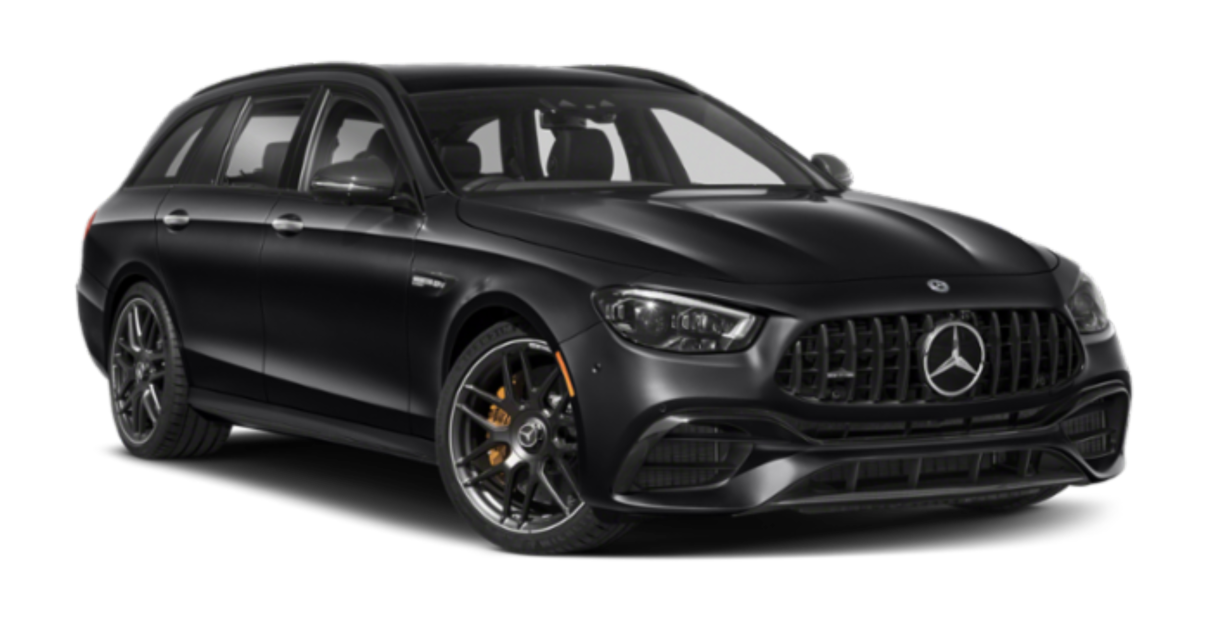 A Mercedes-AMG E63 Estate in motion, showcasing its sleek design and high-performance build against a neutral background.