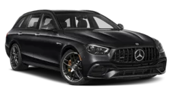 A Mercedes-AMG E63 Estate in motion, showcasing its sleek design and high-performance build against a neutral background.