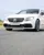 Mercedes-AMG 63 in action on a dynamic driving track at Mercedes-Benz World during a high-performance one-hour experience.