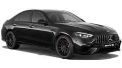 Front view of a Mercedes-AMG C63 showcasing its aggressive grille design and sporty aesthetics in a clean, studio-lit environment.